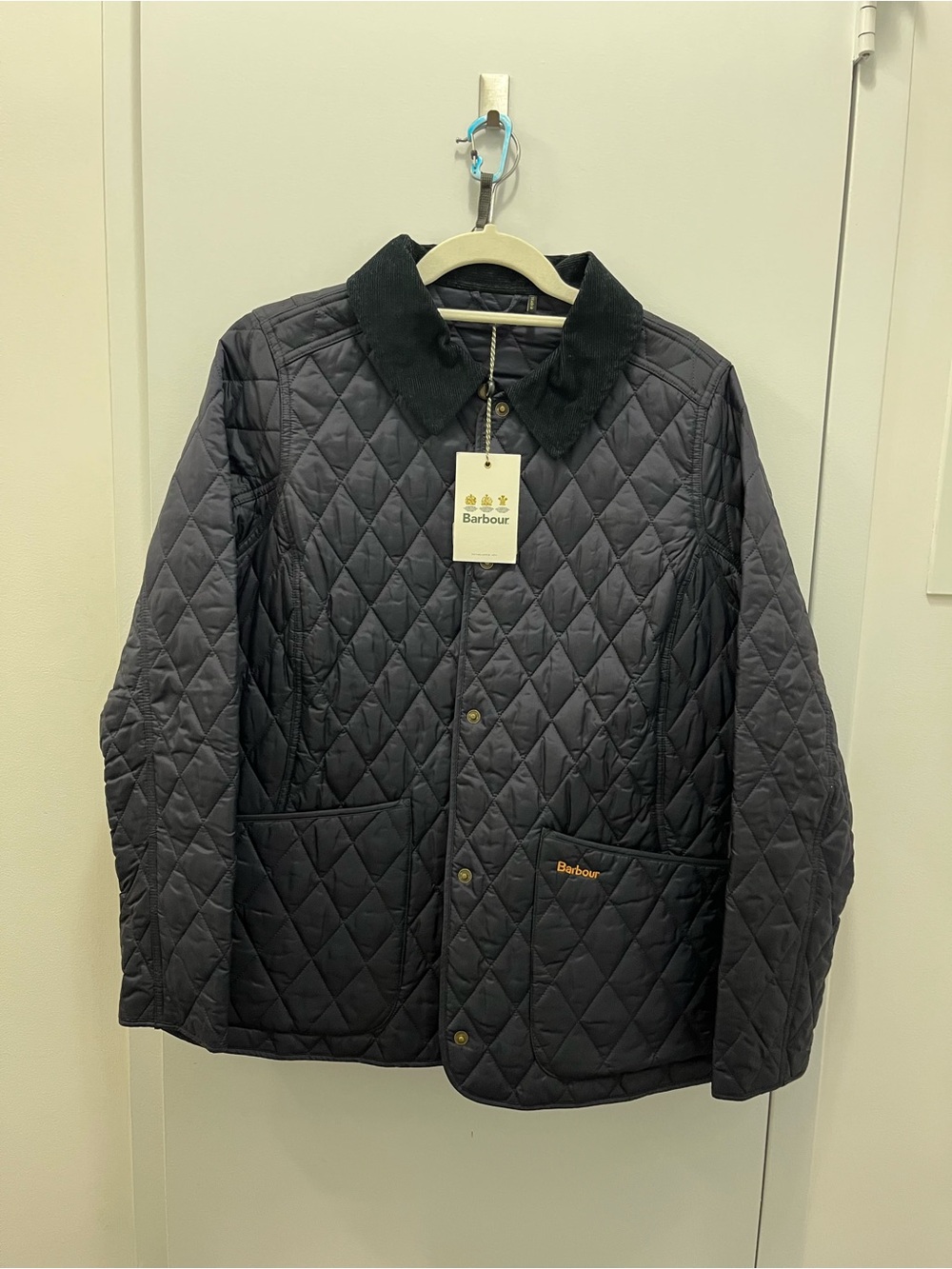 Barbour Quilted Jacket in Navy with Dark Green Cord Collar